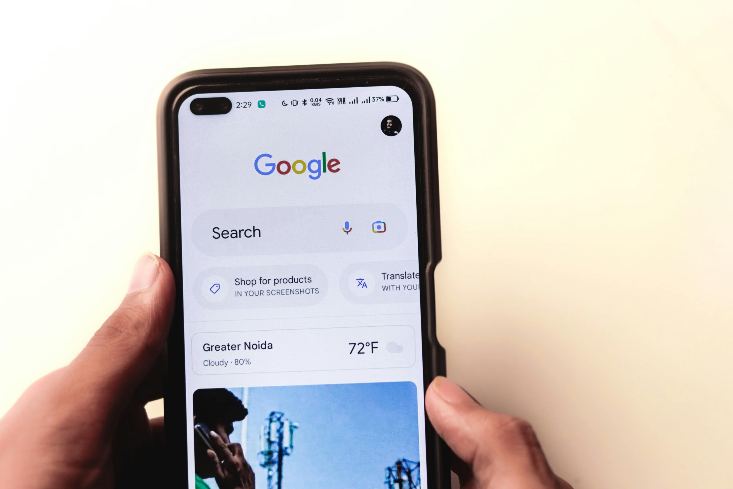 man searches on Google to find the answer to his question